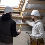 medium-shot-people-working-with-helmets