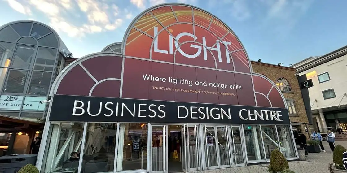LiGHT26-parrotprmarket-EL-1120x560-WCT Business Design Centre entrance with a large curved sign reading LIGHT and slogan about lighting design unity