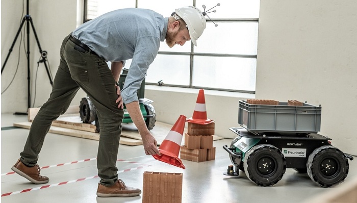 Giving robotic laborers the smarts to help construction crews on-site