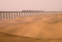 Railway Corridor Built Around The Largest Desert In China