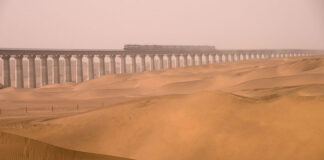 Railway Corridor Built Around The Largest Desert In China