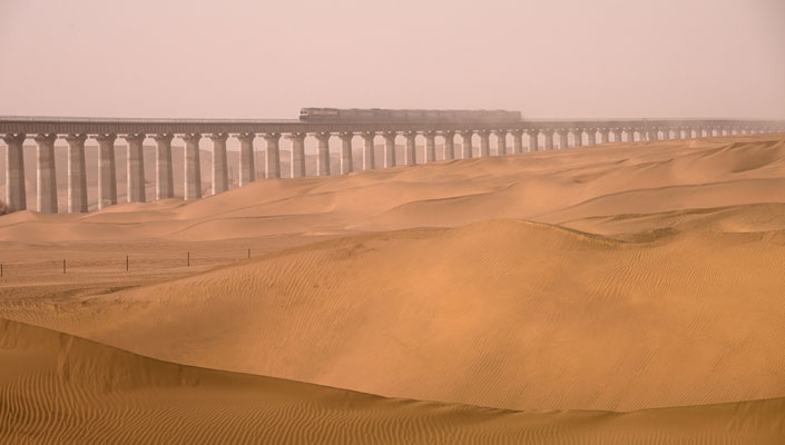 Railway Corridor Built Around The Largest Desert In China